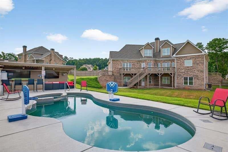 4 bedroom, 5 bathroom, 5,761 sq ft single family residence for sale at 2112 Meadowood Cove, Monroe, GA 30655