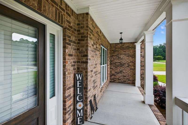 4 bedroom, 5 bathroom, 5,761 sq ft single family residence for sale at 2112 Meadowood Cove, Monroe, GA 30655 — photo 5