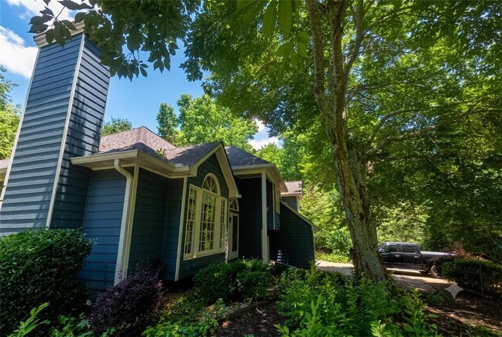 4 bedroom, 3 bathroom, 1,977 sq ft single family residence for sale at 4915 Bayberry Drive, Cumming, GA 30040 — photo 5
