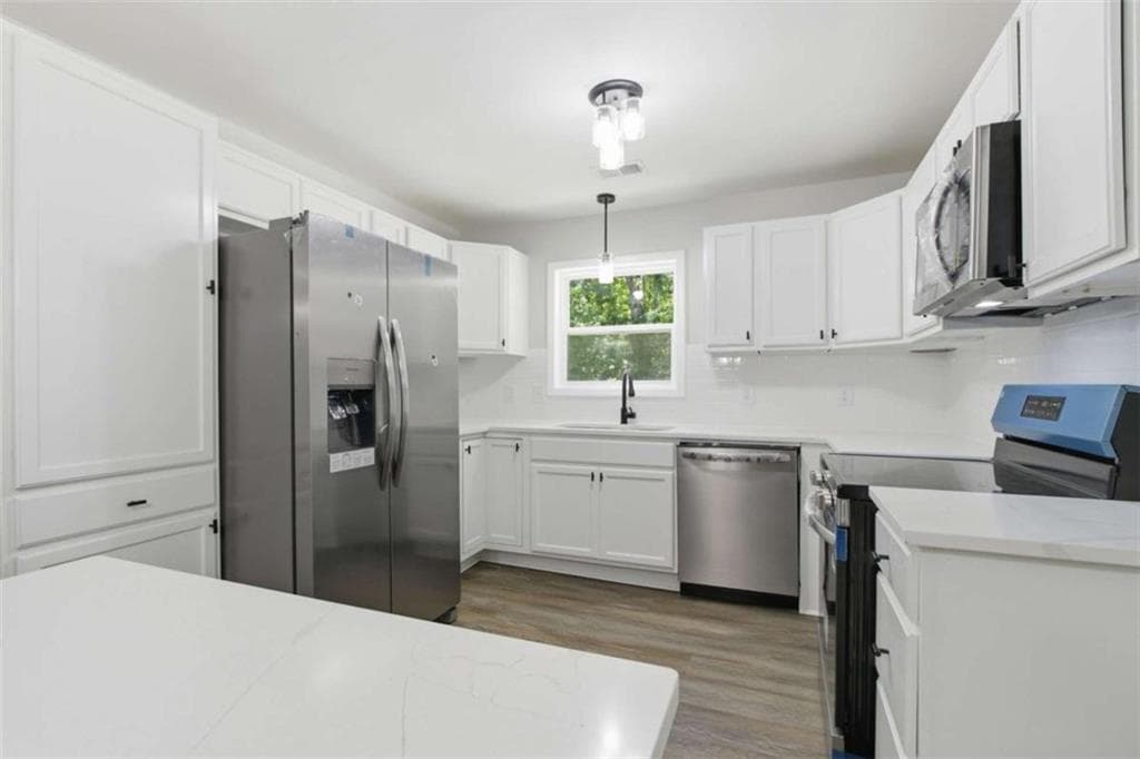 3 bedroom, 2 bathroom, 1,408 sq ft single family residence for sale at 1737 Yellow Street, Conyers, GA 30012 — photo 3