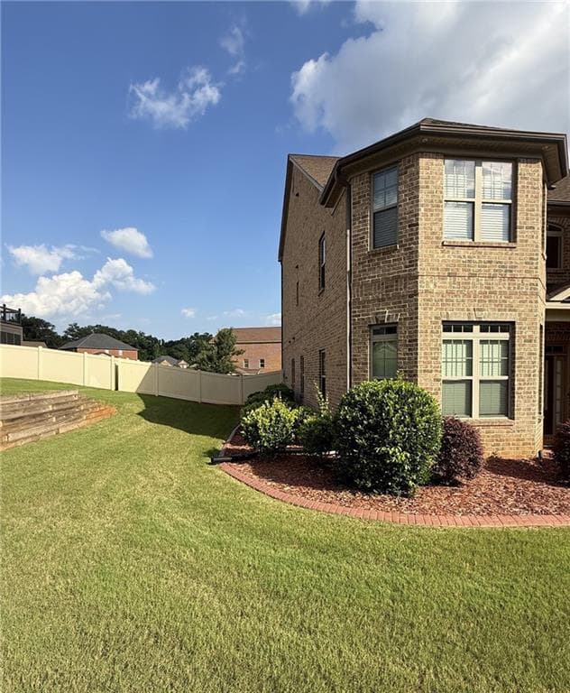 6 bedroom, 5 bathroom, 6,104 sq ft single family residence for sale at 105 Way Point Drive, Stockbridge, GA 30281 — photo 3