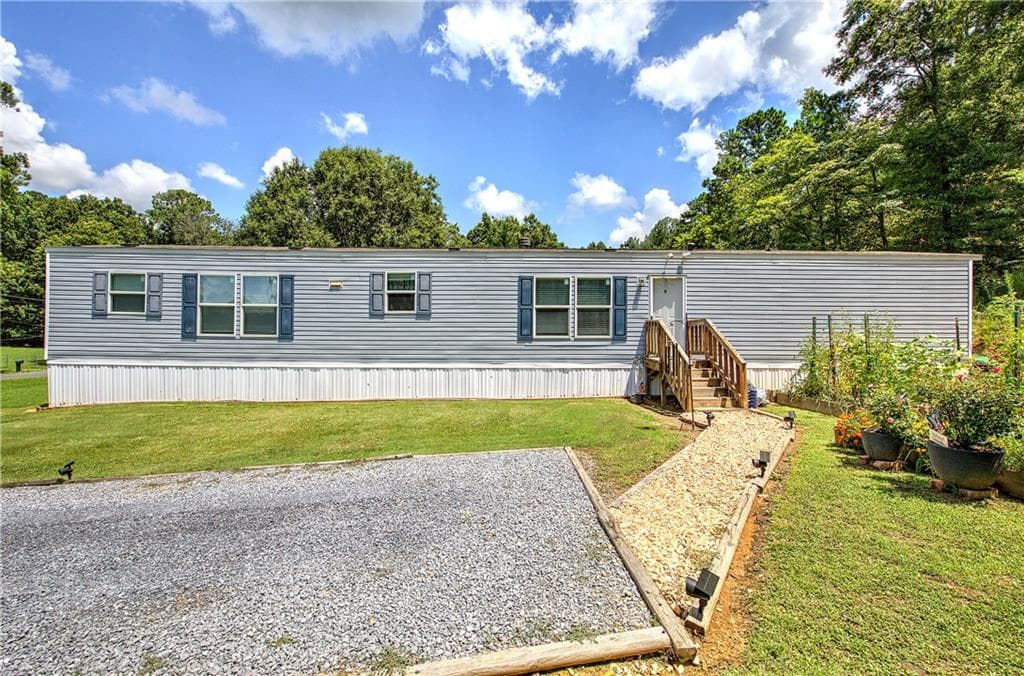 3 bedroom, 2 bathroom, 1,190 sq ft single family residence for sale at 115 Webberdale Drive, Plainville, GA 30733 — photo 2