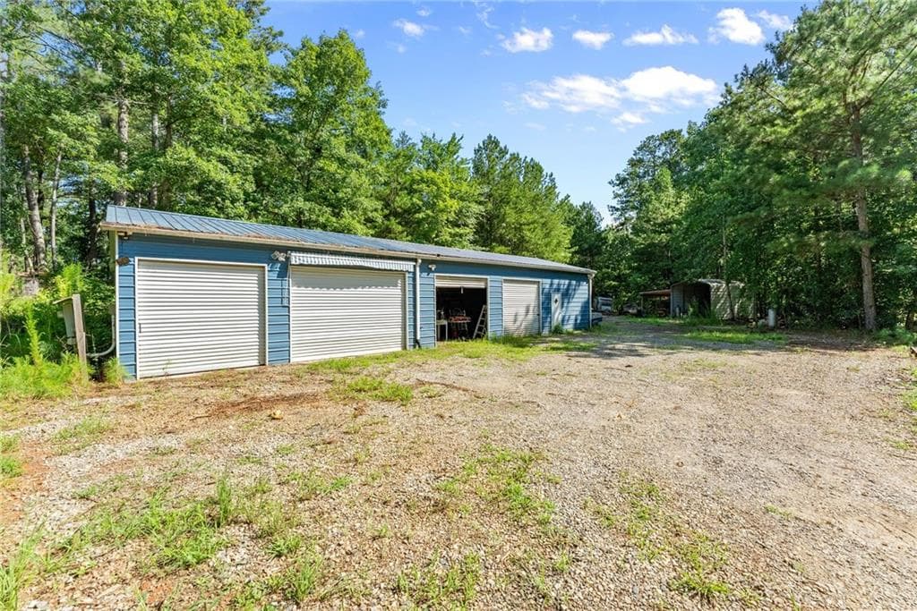 4 bedroom, 3 bathroom, 3,533 sq ft single family residence under contract at 7095 Cogburn Road, Cumming, GA 30028 — photo 3