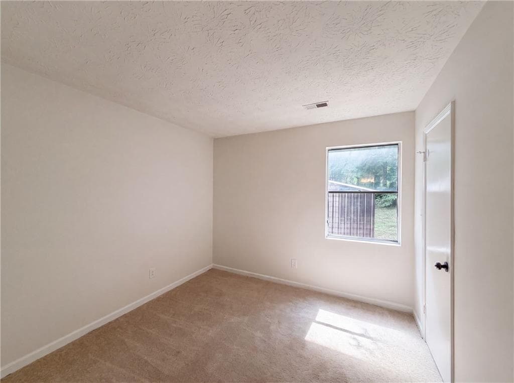 4 bedroom, 2 bathroom, 1,946 sq ft single family residence for sale at 3808 Shane Court, Ellenwood, GA 30294 — photo 4