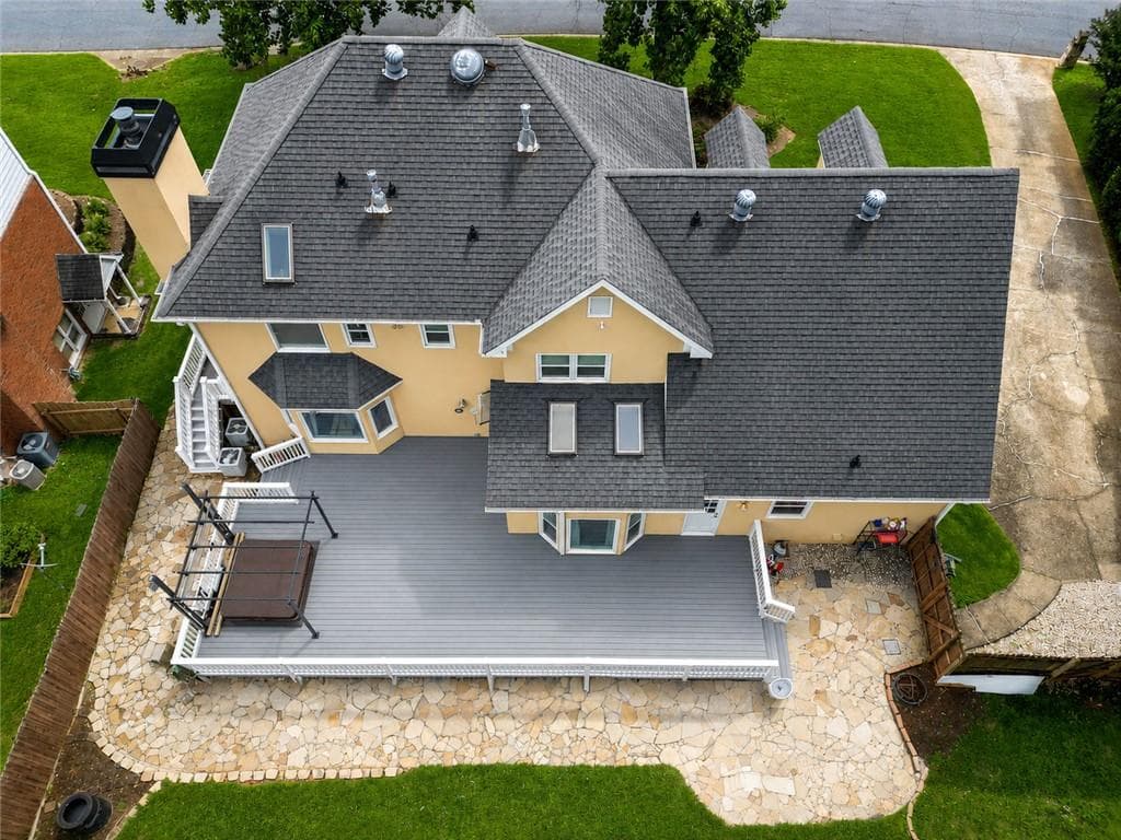 5 bedroom, 4 bathroom, 4,848 sq ft single family residence for sale at 2121 Bennington Court, Lawrenceville, GA 30043 — photo 4