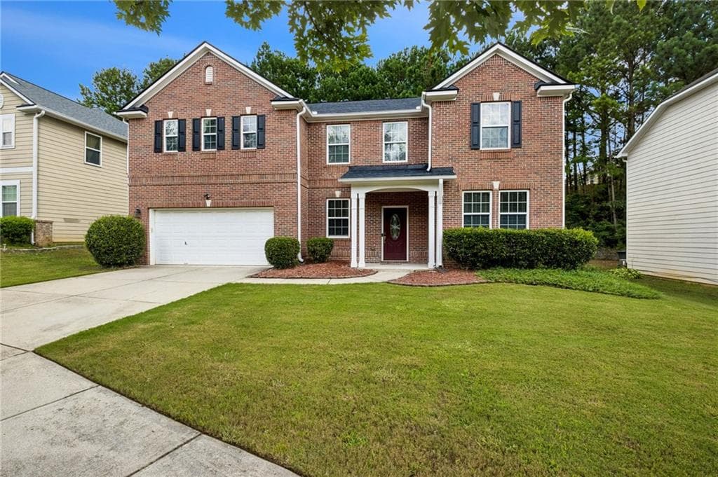 5 bedroom, 3 bathroom, 3,530 sq ft single family residence for sale at 1178 Sparkling Cove Drive, Buford, GA 30518 — photo 4