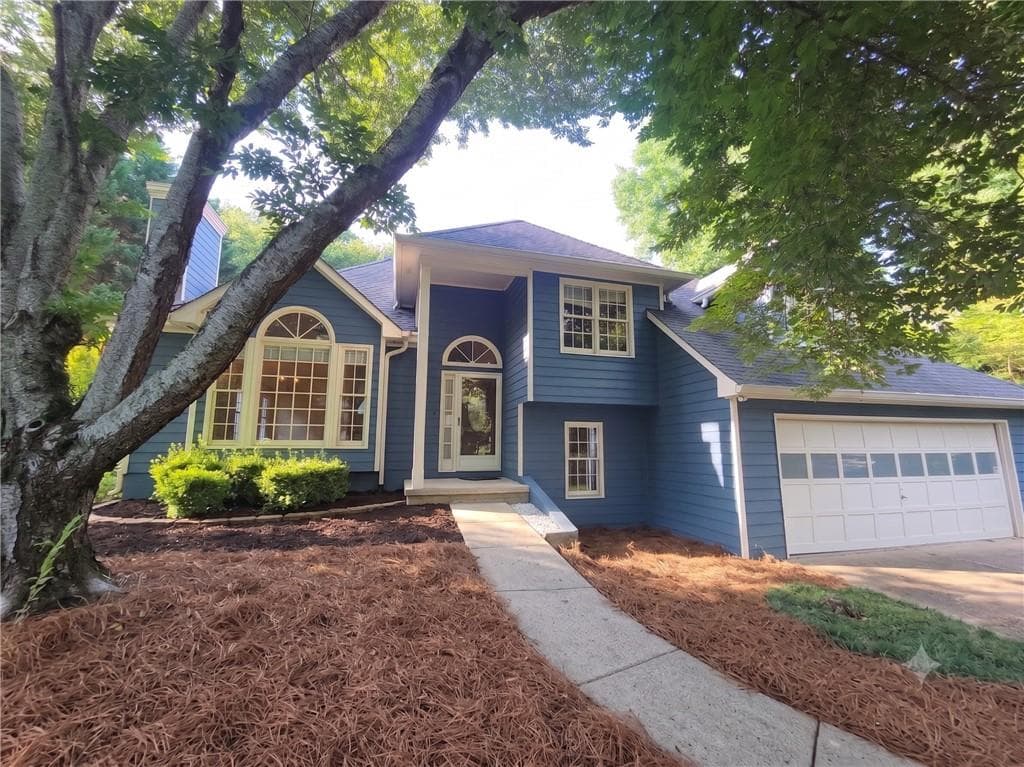 4 bedroom, 3 bathroom, 1,977 sq ft single family residence for sale at 4915 Bayberry Drive, Cumming, GA 30040 — photo 2