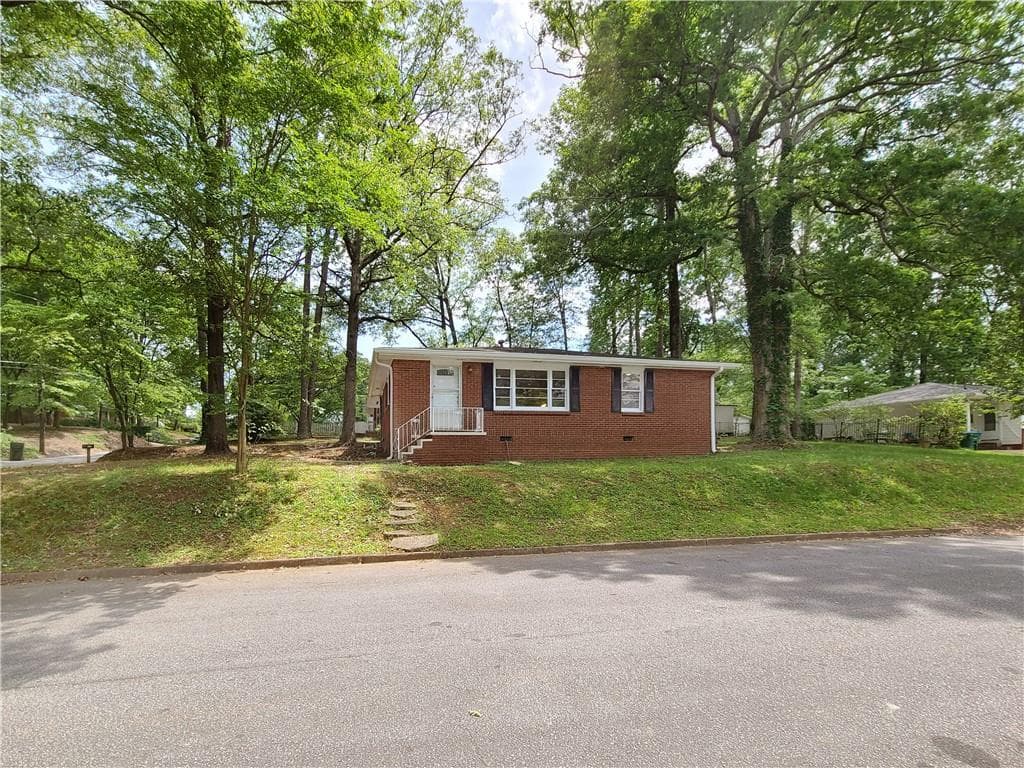 3 bedroom, 2 bathroom, 1,176 sq ft single family residence for rent at 3225 Forrest Hills Drive, Hapeville, GA 30354 for $1,500 a month — photo 1 of 61