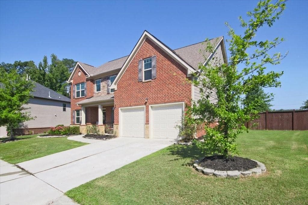 5 bedroom, 4 bathroom, 3,166 sq ft single family residence for sale at 159 Azalea Bloom Drive, Loganville, GA 30052 — photo 2