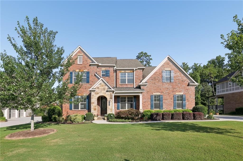 6 bedroom, 5 bathroom, 4,134 sq ft single family residence for sale at 6195 Read Road, Suwanee, GA 30024