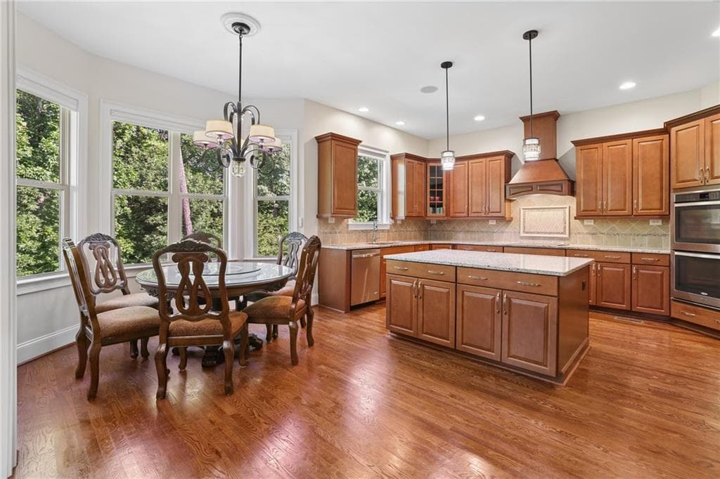 6 bedroom, 5 bathroom, 4,134 sq ft single family residence for sale at 6195 Read Road, Suwanee, GA 30024 — photo 7