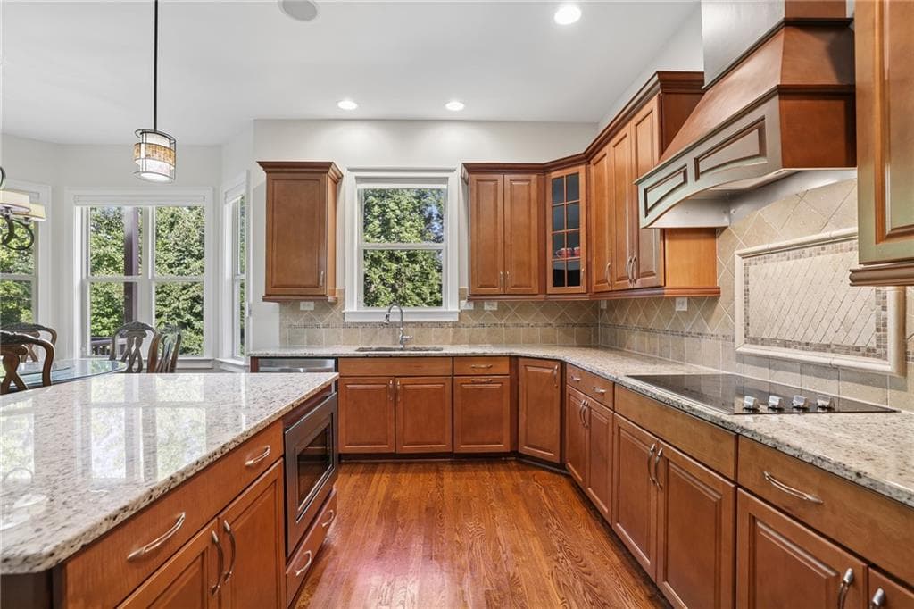 6 bedroom, 5 bathroom, 4,134 sq ft single family residence for sale at 6195 Read Road, Suwanee, GA 30024 — photo 9