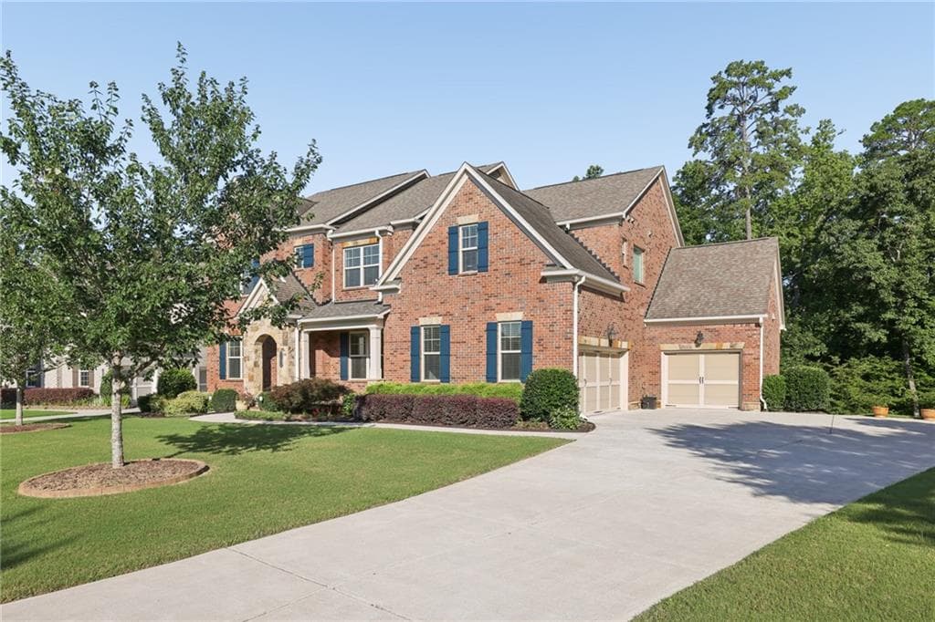 6 bedroom, 5 bathroom, 4,134 sq ft single family residence for sale at 6195 Read Road, Suwanee, GA 30024 — photo 2