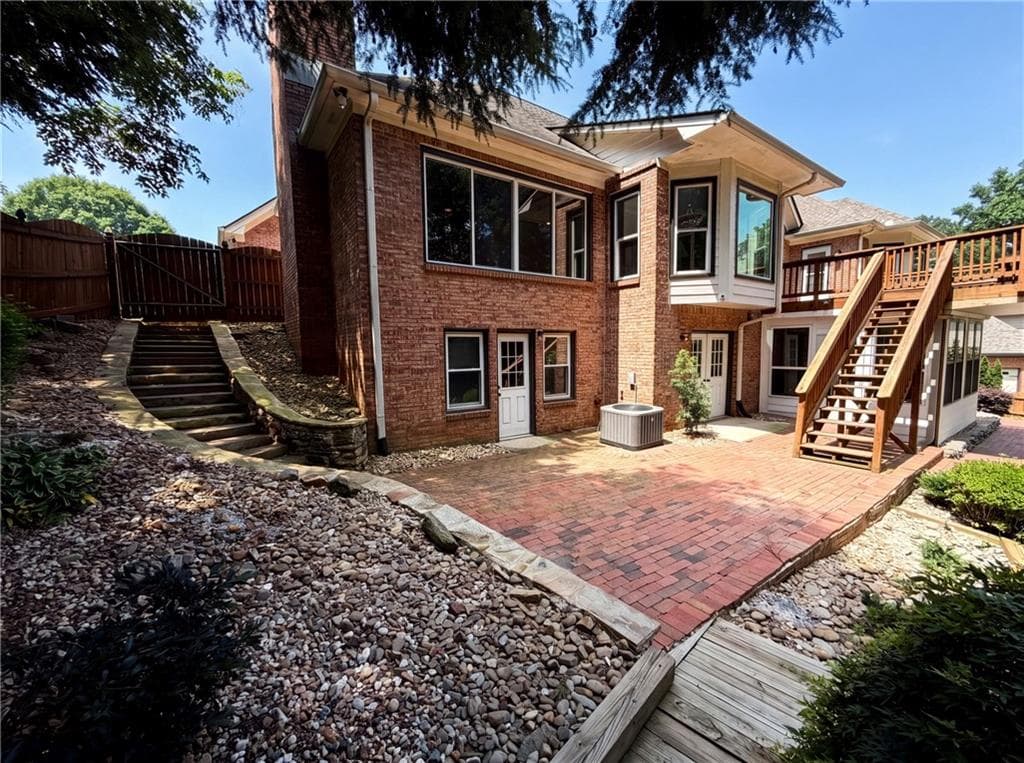4 bedroom, 4 bathroom, 5,384 sq ft single family residence for sale at 135 N Clublands Court, Johns Creek, GA 30022 — photo 5