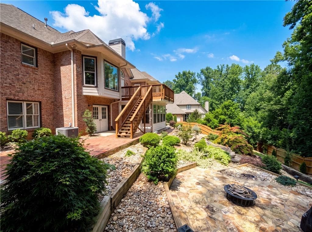 4 bedroom, 4 bathroom, 5,384 sq ft single family residence for sale at 135 N Clublands Court, Johns Creek, GA 30022 — photo 9