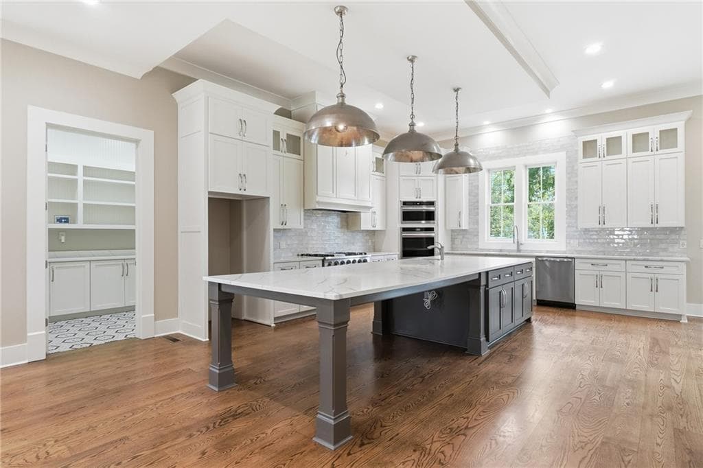 4 bedroom, 5 bathroom, 5,452 sq ft single family residence for sale at 127 Griffin Street, Mcdonough, GA 30253 — photo 9
