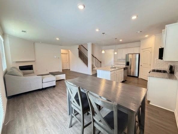 5 bedroom, 3 bathroom, 2,539 sq ft single family residence for sale at 5634 Cricket Melody Lane, Flowery Branch, GA 30542 — photo 8