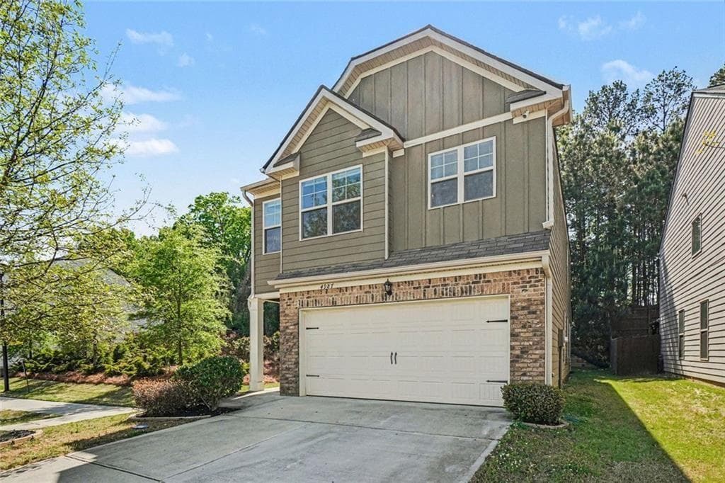 4 bedroom, 3 bathroom, 2,050 sq ft single family residence for sale at 4987 Rapahoe, Atlanta, GA 30349 — photo 2