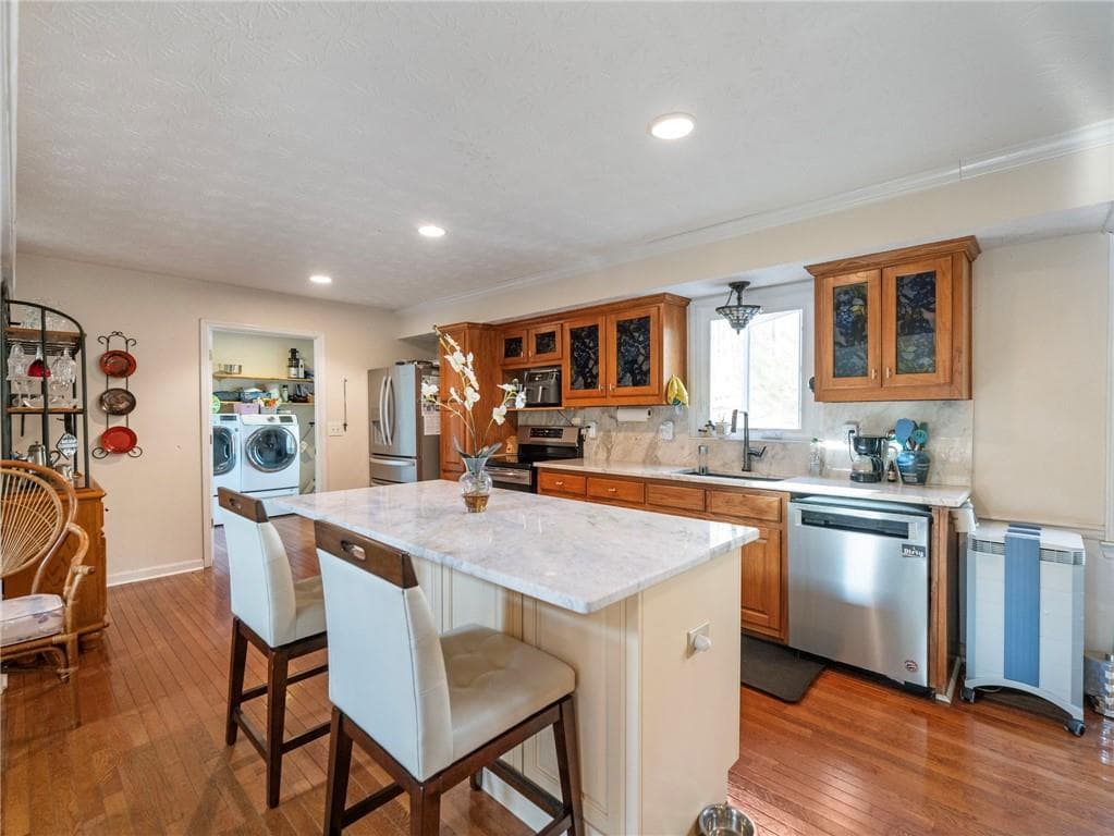 3 bedroom, 3 bathroom, 1,476 sq ft single family residence for sale at 7389 Williams Road, Flowery Branch, GA 30542 — photo 4