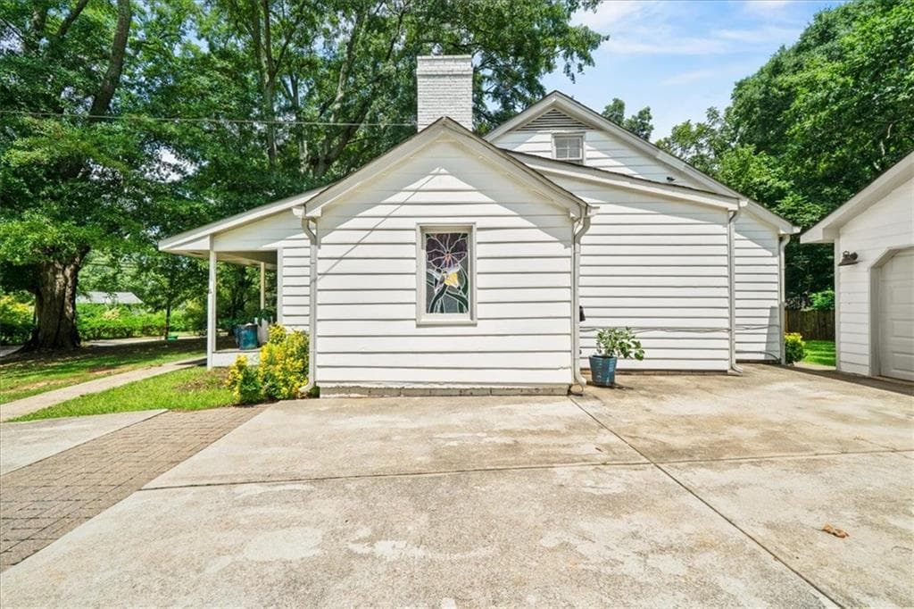 3 bedroom, 2 bathroom, 1,413 sq ft single family residence for sale at 1661 Hudson Road, Decatur, GA 30033 — photo 3