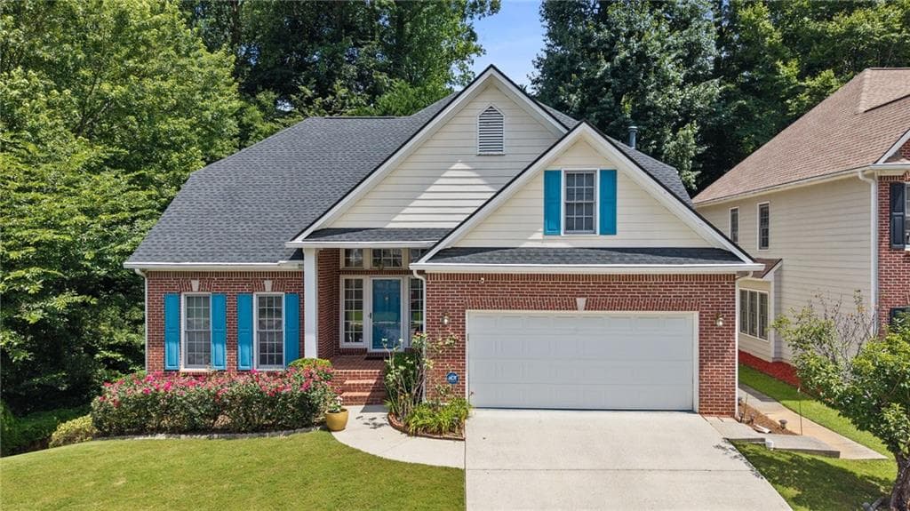 6 bedroom, 4 bathroom, 4,152 sq ft single family residence for sale at 2910 Arbor Creek Lane, Atlanta, GA 30340 — photo 2