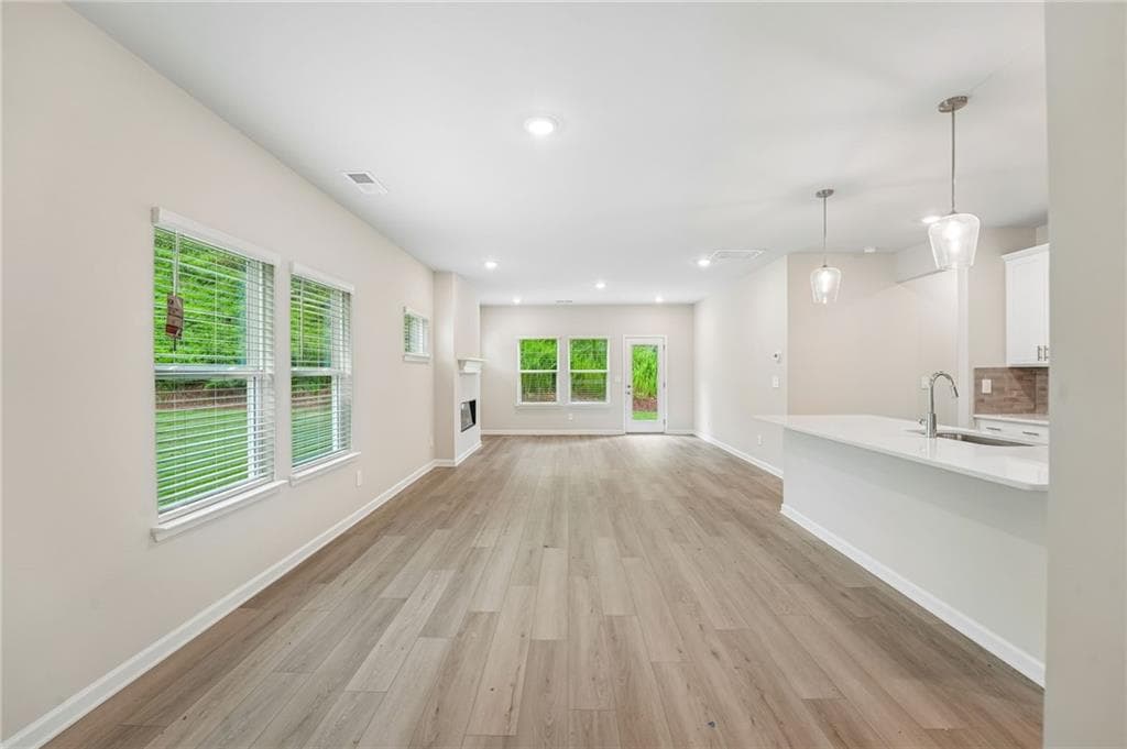 5 bedroom, 3 bathroom, 2,352 sq ft single family residence for sale at 5205 Abdulla Drive, Cumming, GA 30041 — photo 9