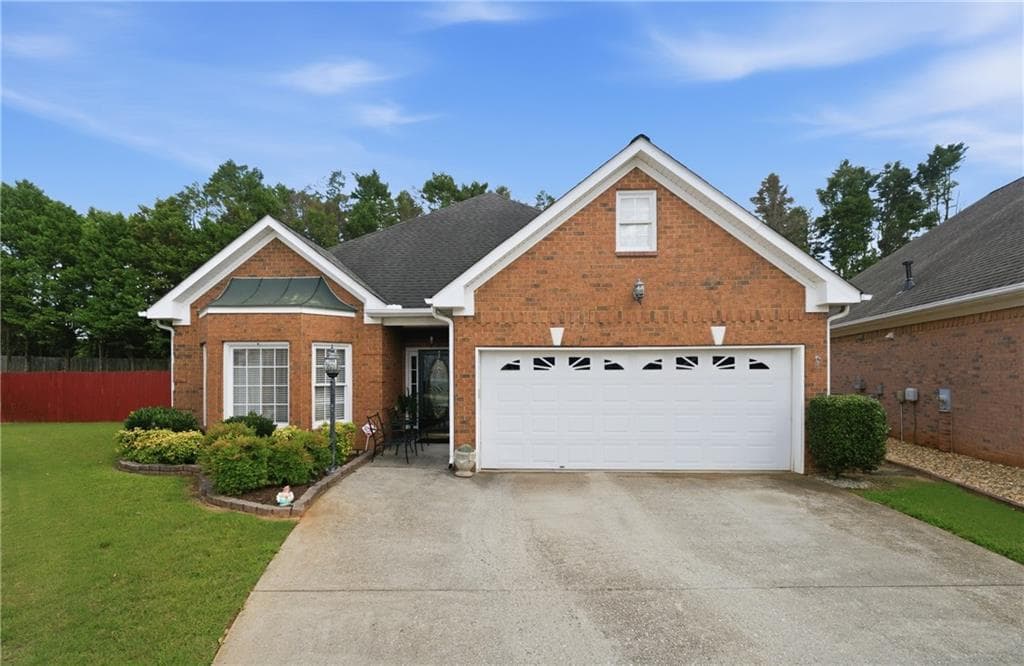3 bedroom, 2 bathroom, 2,233 sq ft single family residence for sale at 2220 Stockton Walk Lane, Snellville, GA 30078 — photo 2