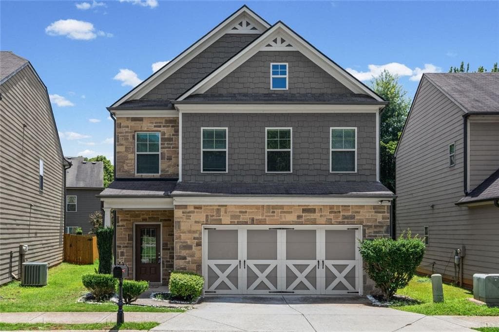 4 bedroom, 3 bathroom, 2,300 sq ft single family residence for sale at 5343 Catrina Way, Buford, GA 30519 — photo 2