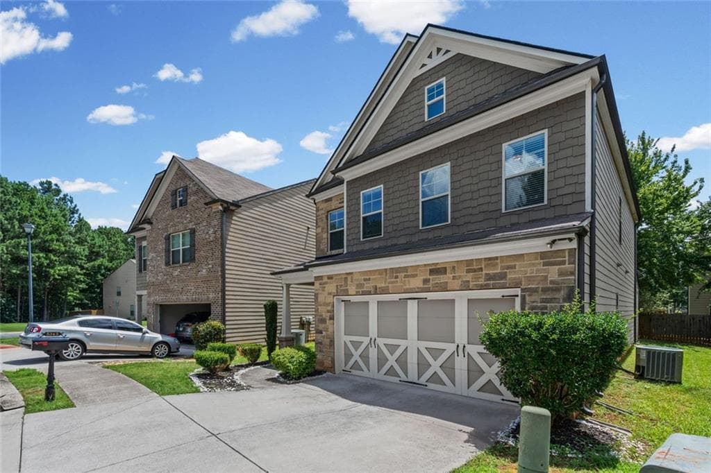 4 bedroom, 3 bathroom, 2,300 sq ft single family residence for sale at 5343 Catrina Way, Buford, GA 30519 — photo 4