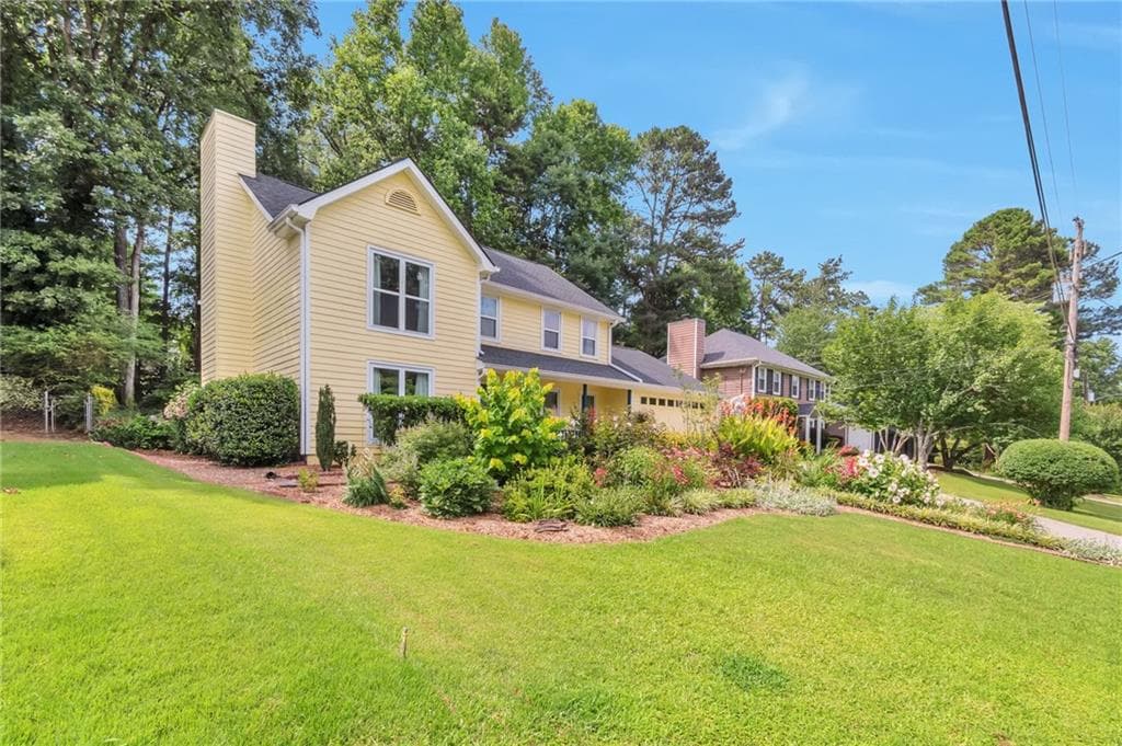 4 bedroom, 3 bathroom, 1,984 sq ft single family residence for sale at 6697 Gunstock Lane, Tucker, GA 30084 — photo 2