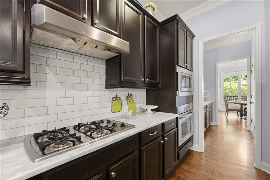 6 bedroom, 5 bathroom, 5,240 sq ft single family residence for sale at 11880 Old Station Place, Alpharetta, GA 30004 — photo 9