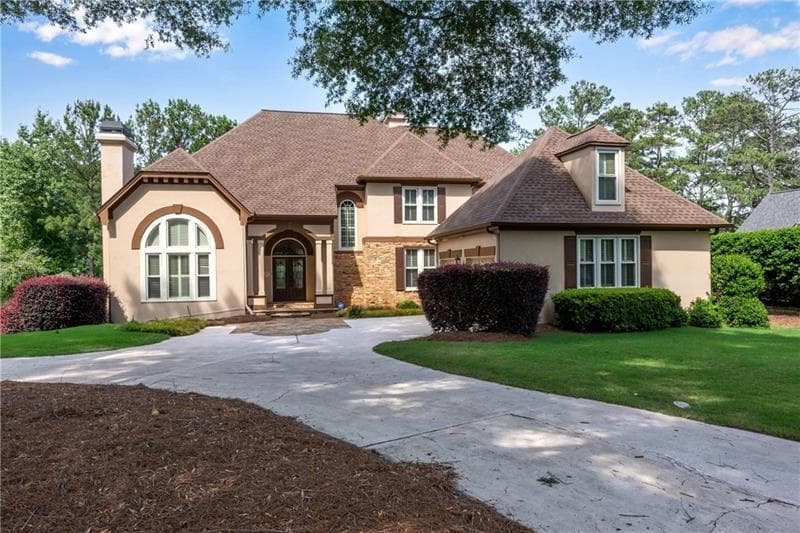 7 bedroom, 5 bathroom, 6,095 sq ft single family residence under contract at 1006 Quaker Ridge Way, Johns Creek, GA 30097