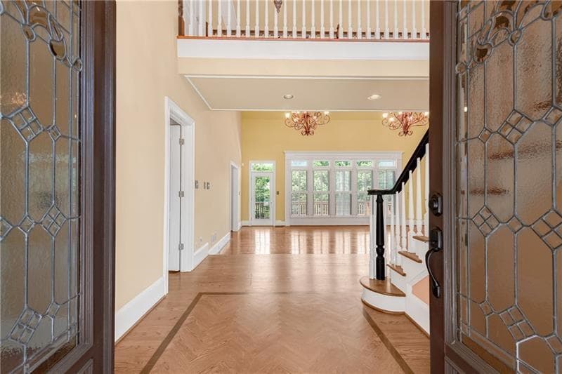 7 bedroom, 5 bathroom, 6,095 sq ft single family residence for sale at 1006 Quaker Ridge Way, Johns Creek, GA 30097 — photo 3