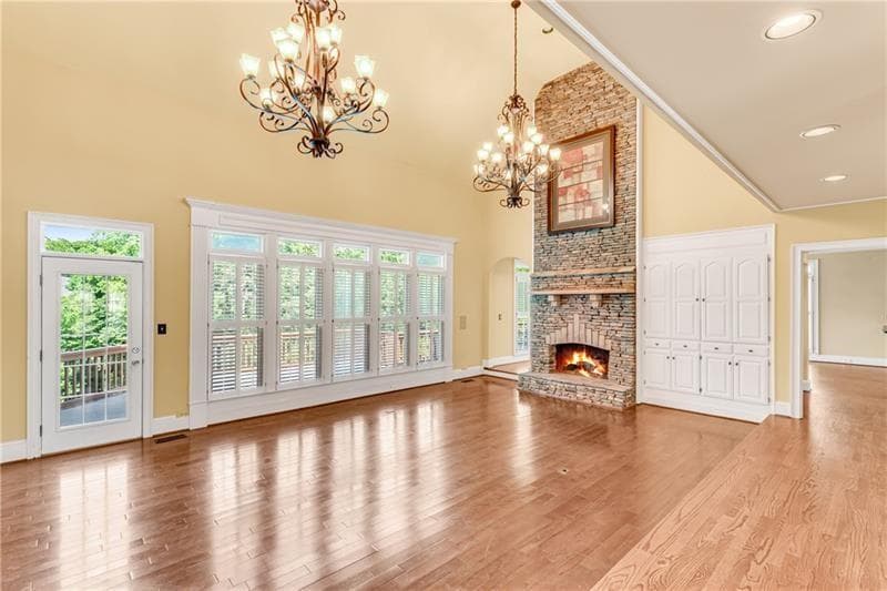 7 bedroom, 5 bathroom, 6,095 sq ft single family residence for sale at 1006 Quaker Ridge Way, Johns Creek, GA 30097 — photo 7