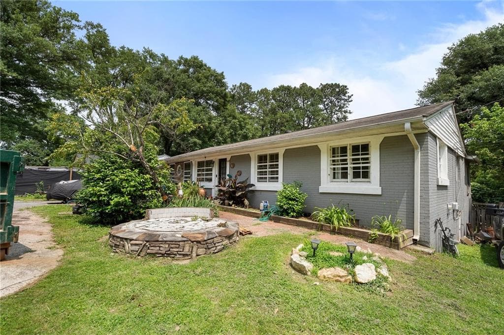 4 bedroom, 2 bathroom, 1,776 sq ft single family residence sold at 1550 Bells Ferry Road, Marietta, GA 30066