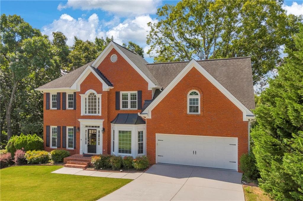 5 bedroom, 4 bathroom, 4,438 sq ft single family residence for sale at 4910 Red Robin Ridge, Johns Creek, GA 30022