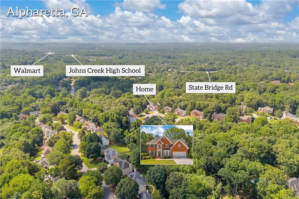 5 bedroom, 4 bathroom, 4,438 sq ft single family residence for sale at 4910 Red Robin Ridge, Johns Creek, GA 30022 — photo 4