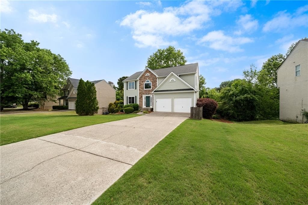 4 bedroom, 4 bathroom, 3,092 sq ft single family residence for sale at 1339 Dalesford Drive, Alpharetta, GA 30004 — photo 2