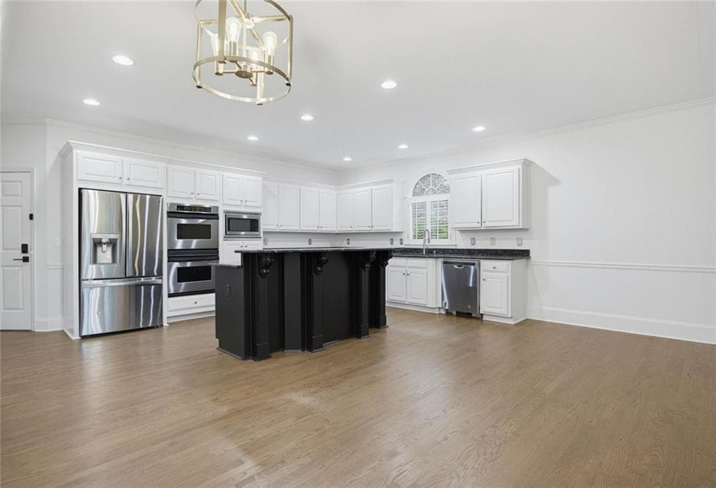 6 bedroom, 5 bathroom, 6,010 sq ft single family residence for sale at 735 Westwind Lane, Alpharetta, GA 30005 — photo 9