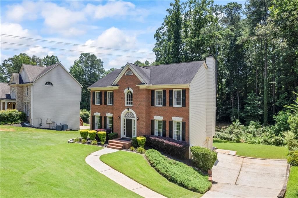5 bedroom, 3 bathroom, 3,436 sq ft single family residence for sale at 2500 Ashbourne Drive, Lawrenceville, GA 30043 — photo 2