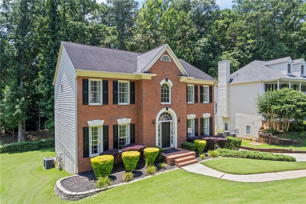 5 bedroom, 3 bathroom, 3,436 sq ft single family residence for sale at 2500 Ashbourne Drive, Lawrenceville, GA 30043 — photo 3