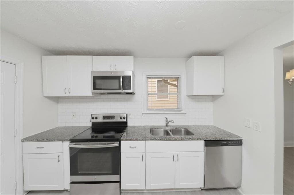 3 bedroom, 2 bathroom, 1,106 sq ft single family residence for sale at 2153 Burroughs Avenue, Atlanta, GA 30315 — photo 4