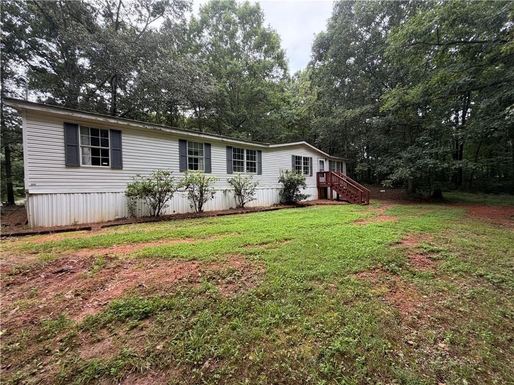 3 bedroom, 2 bathroom, 1,782 sq ft single family residence for sale at 4131 Tribble Road, Cumming, GA 30028
