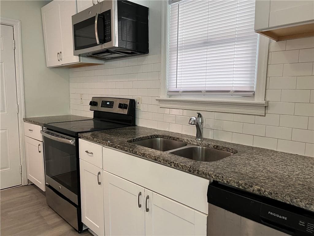 3 bedroom, 2 bathroom, 1,106 sq ft single family residence for sale at 2153 Burroughs Avenue, Atlanta, GA 30315 — photo 2
