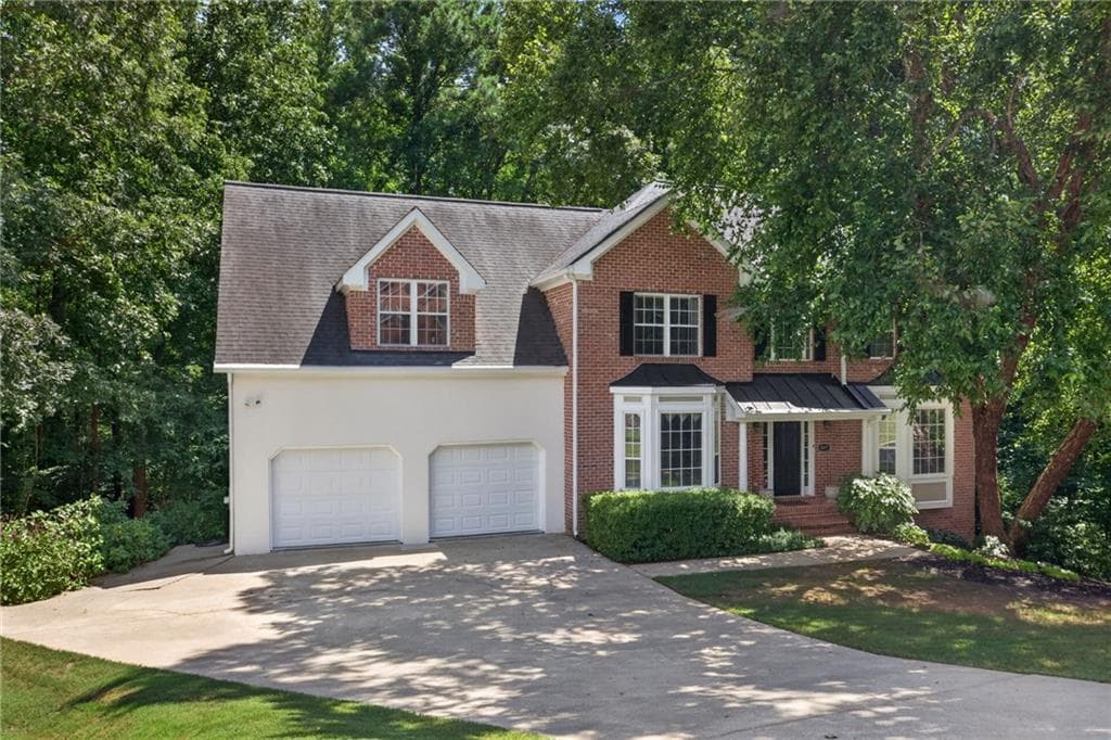 4 bedroom, 3 bathroom, 3,220 sq ft single family residence for sale at 3887 Old Savannah Court, Douglasville, GA 30135 — photo 1 of 55