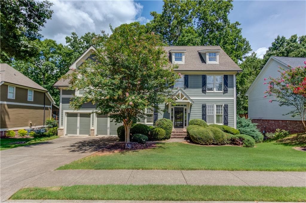 5 bedroom, 4 bathroom, 3,192 sq ft single family residence for sale at 5989 Grand Loop Road, Sugar Hill, GA 30518 — photo 2