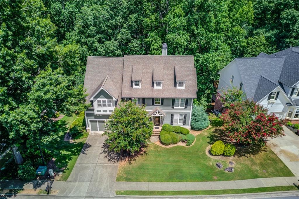 5 bedroom, 4 bathroom, 3,192 sq ft single family residence for sale at 5989 Grand Loop Road, Sugar Hill, GA 30518 — photo 3