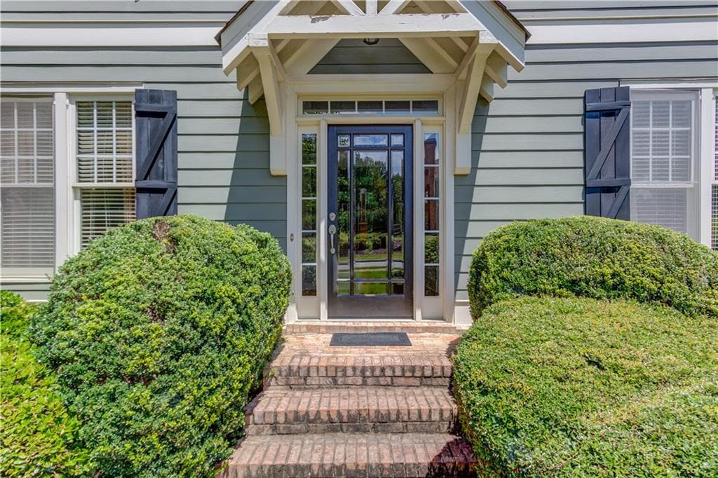 5 bedroom, 4 bathroom, 3,192 sq ft single family residence for sale at 5989 Grand Loop Road, Sugar Hill, GA 30518 — photo 4