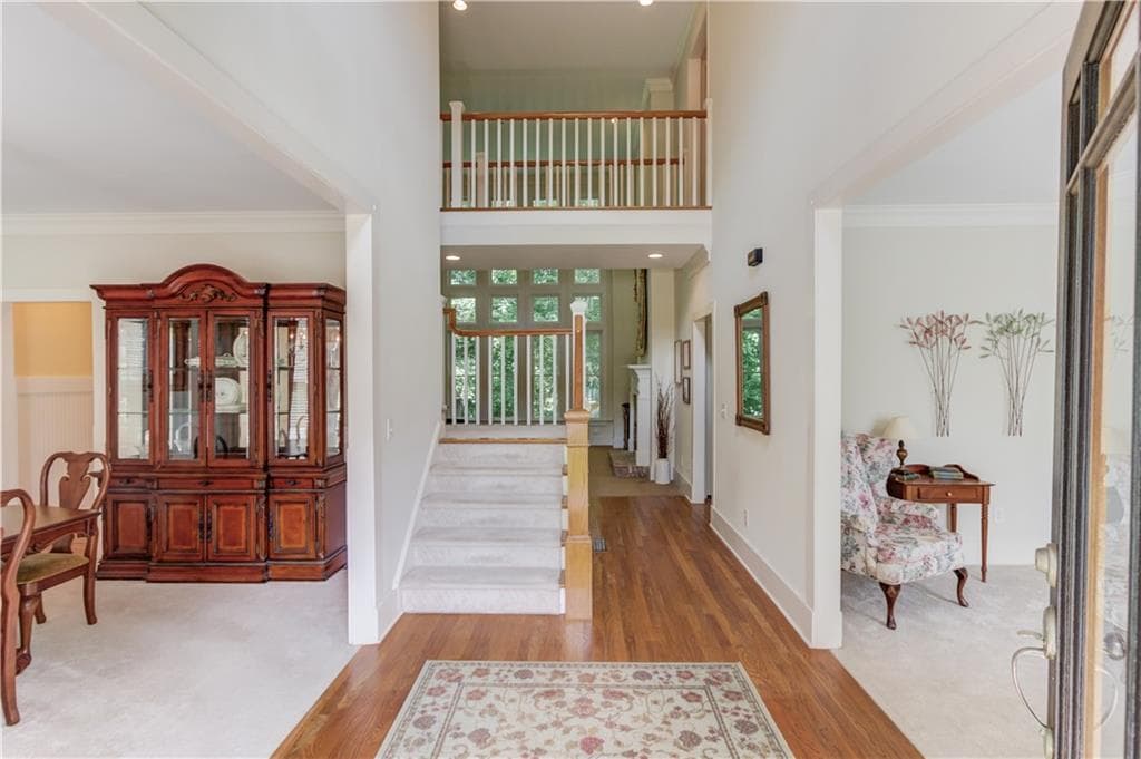 5 bedroom, 4 bathroom, 3,192 sq ft single family residence for sale at 5989 Grand Loop Road, Sugar Hill, GA 30518 — photo 5