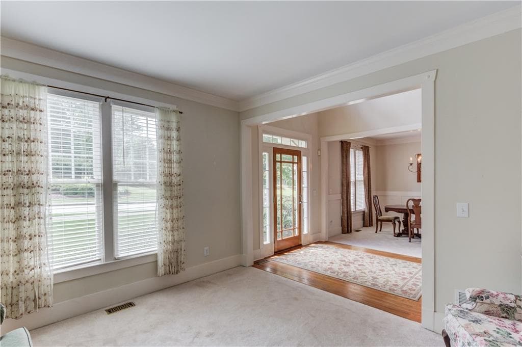 5 bedroom, 4 bathroom, 3,192 sq ft single family residence for sale at 5989 Grand Loop Road, Sugar Hill, GA 30518 — photo 7